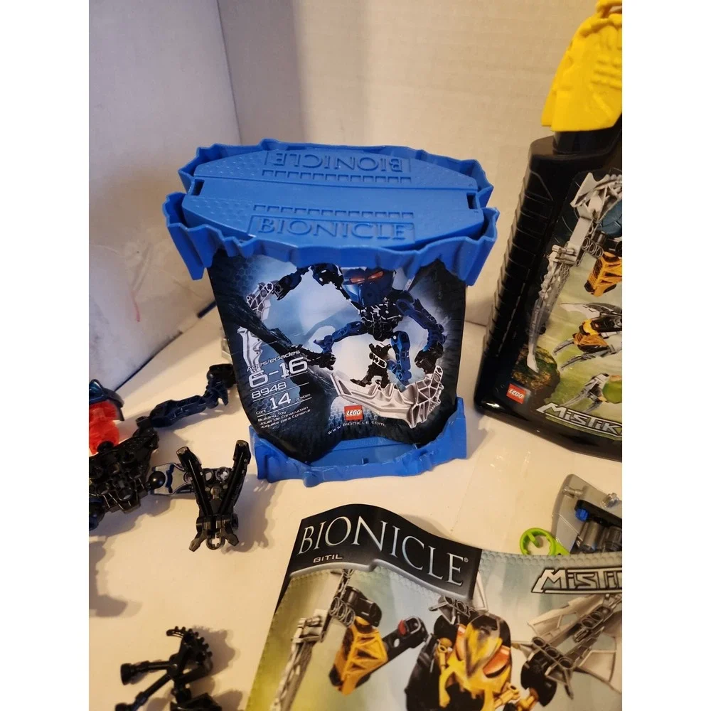 LEGO BIONICLE Mistika Gavla LOT- Masks, Weapons, misc parts Cases Manuals